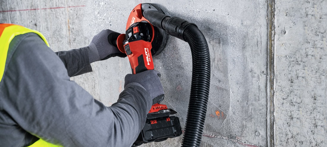 Desbastar um muro de betão com uma polidora Hilti