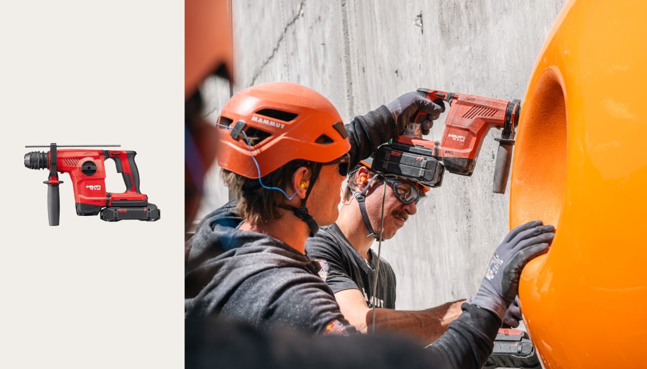 Gros plan de deux créateurs d'itinéraires sécurisant une prise à l'aide d'un perforateur sans fil Hilti TE 6-22.